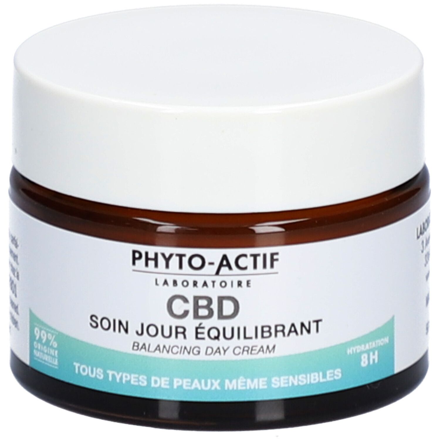 Crèmepot met witte deksel en bruin glas. Opschrift: PHYTO-ACTIF CBD Soin Jour Équilibrant. 99% origine naturelle.
