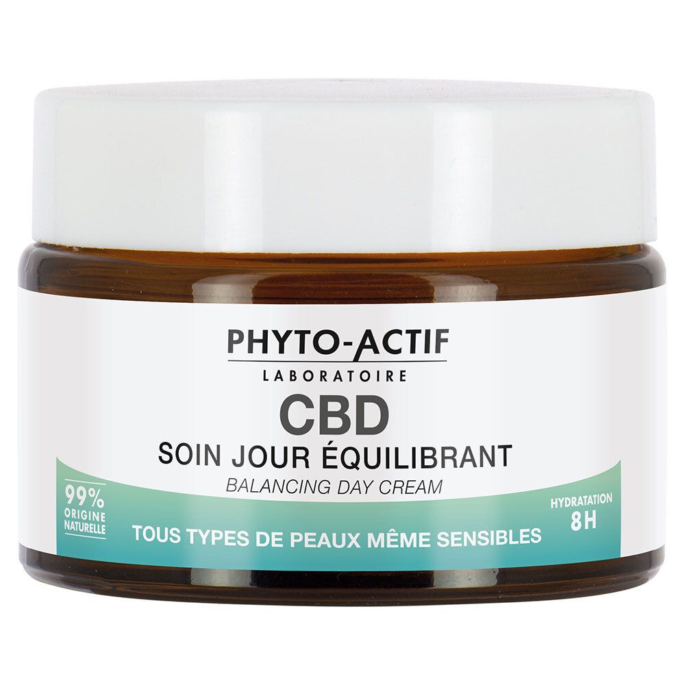 Bruine crème pot met witte deksel. Tekst: PHYTO-ACTIF, CBD, Soin Jour Équilibrant. 99% Origine Naturelle, Hydratation 8H.