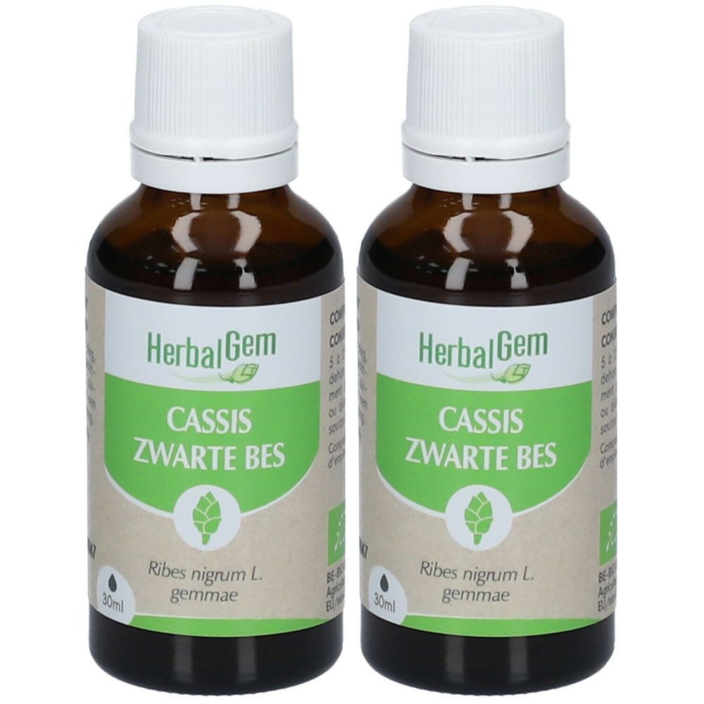 Twee bruine glazen flessen met witte dop. Etiket met "HerbalGem", "Cassis Zwarte Bes" en bio-label.