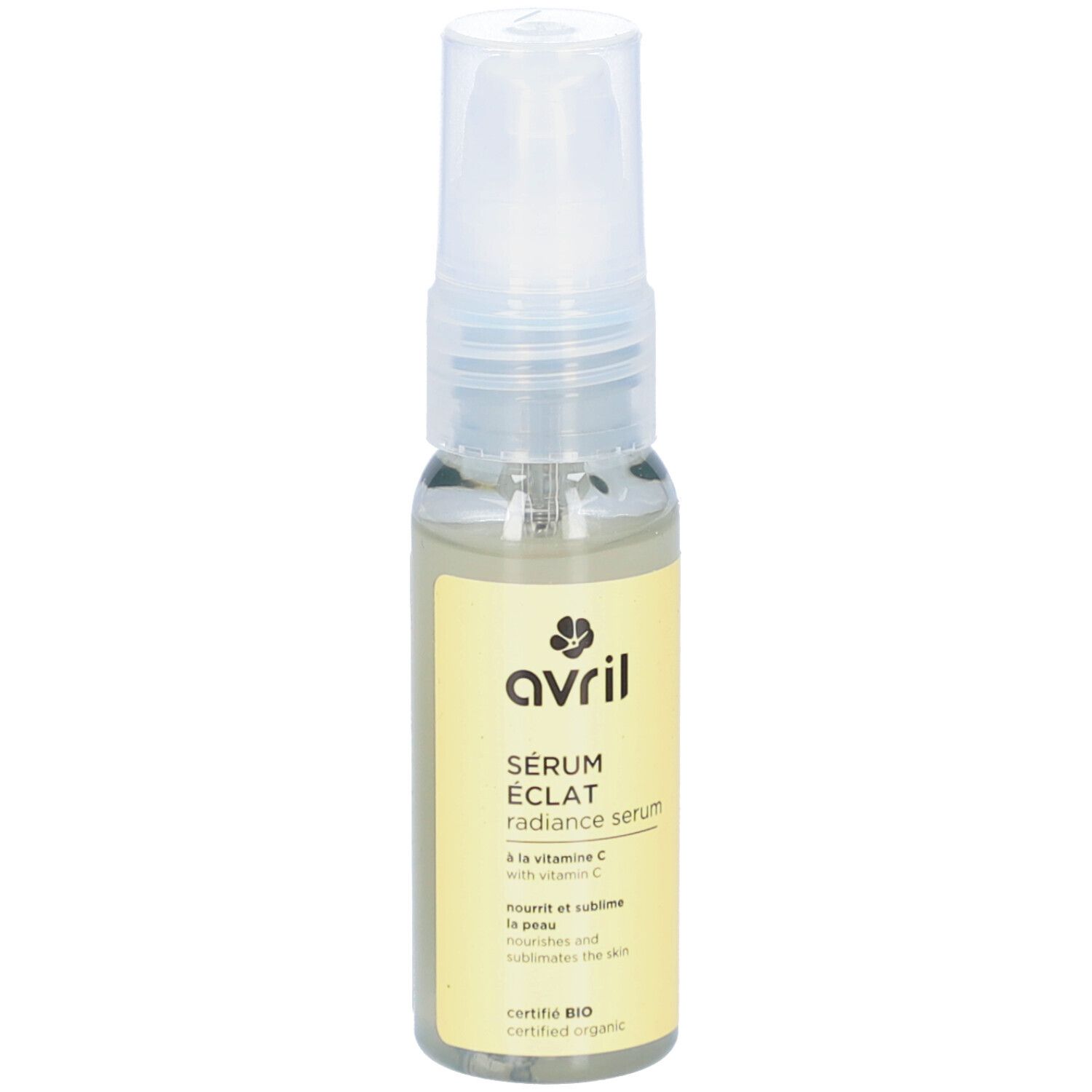 AVRIL Sérum Eclat, transparante vloeistof in een glazen fles met verstuiver. Gele sticker met tekst en logo.