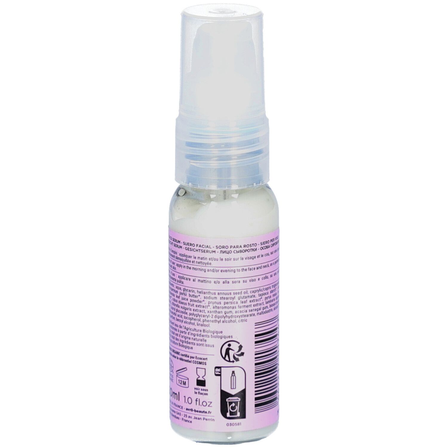 Dos du flacon. Texte et symboles. Pompe transparente.