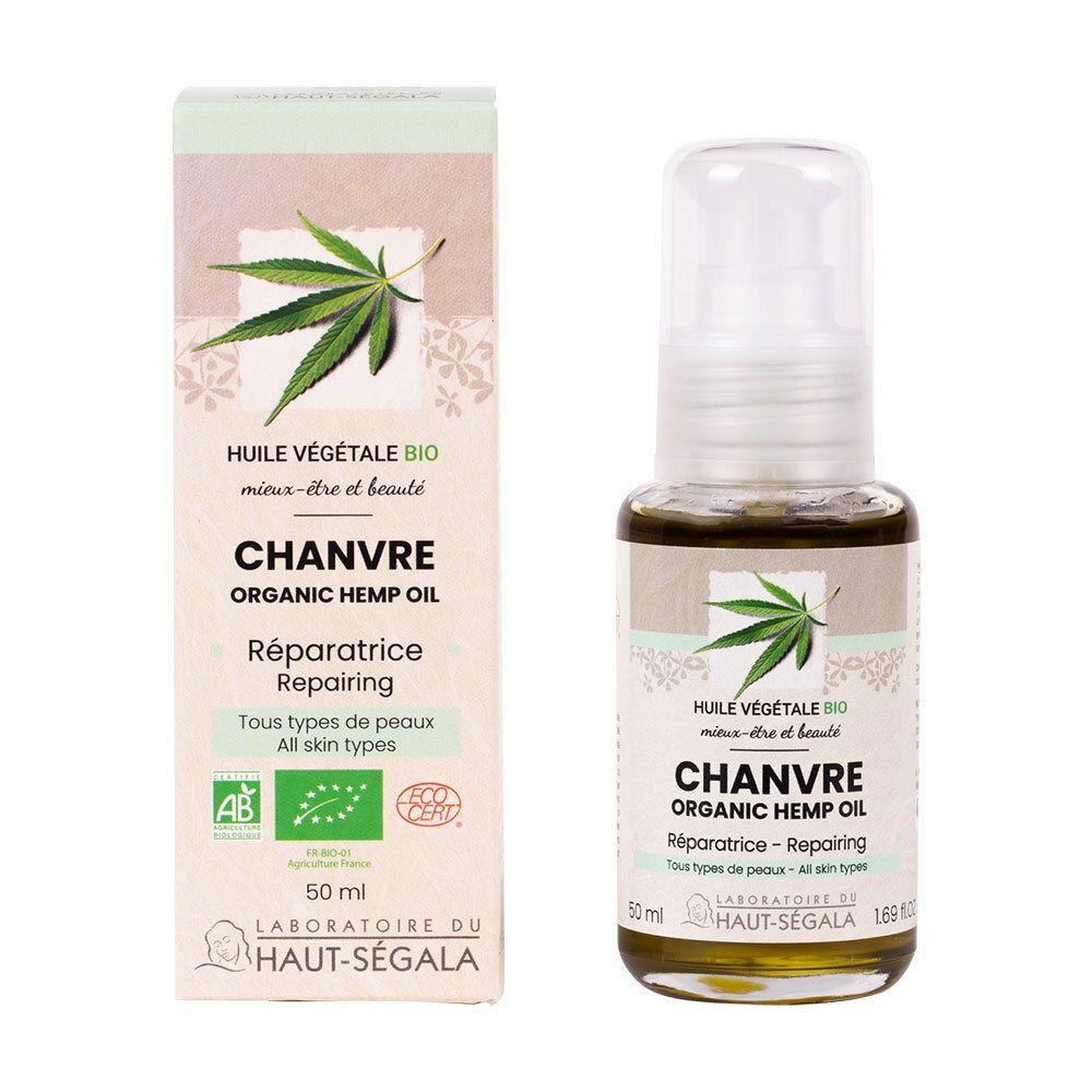 Flacon d'huile de chanvre bio et carton. Inscription: Chanvre, Organic Hemp Oil, Réparatrice, Tous types de peaux. Labels AB et Ecocert.