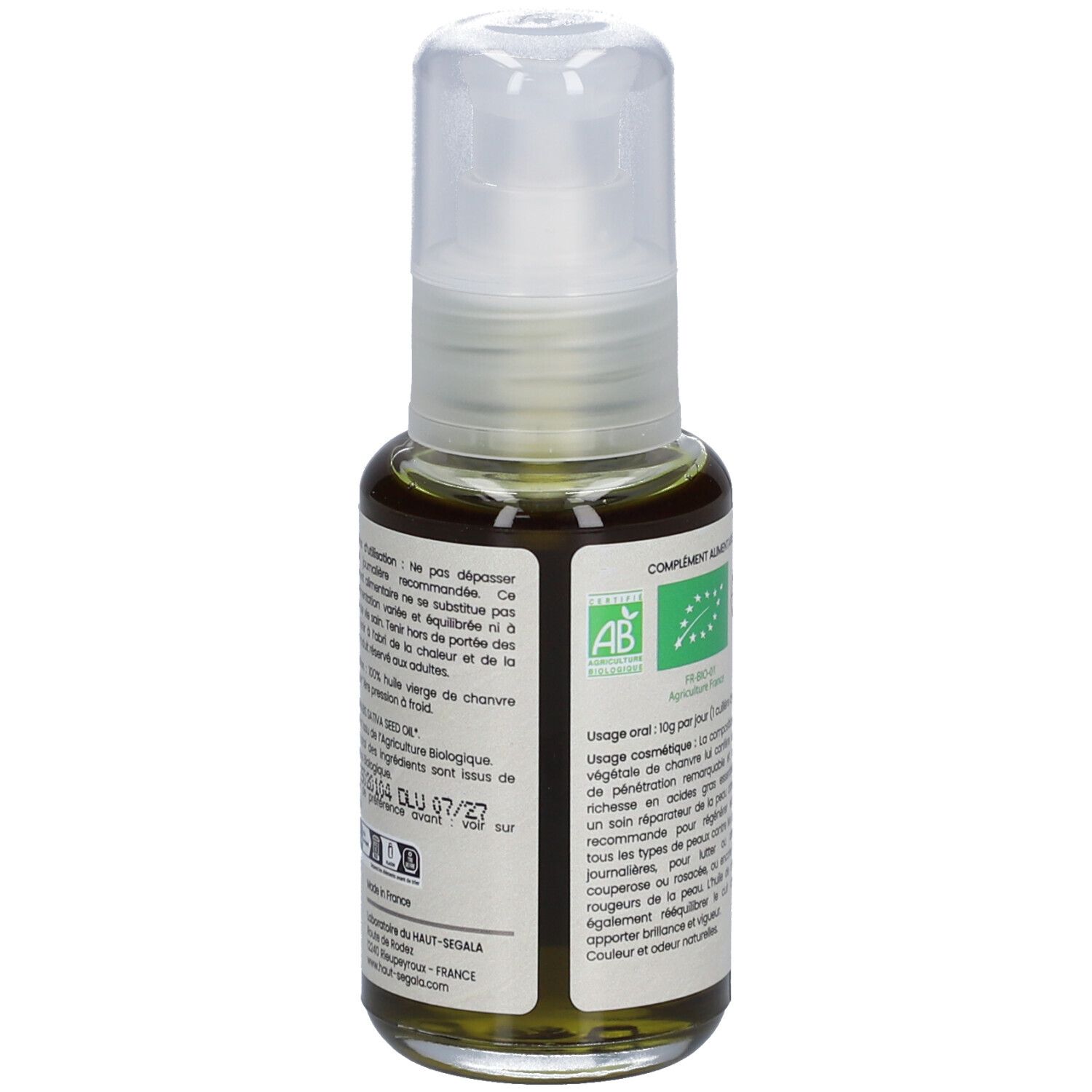 Flacon en verre avec pompe. Inscription: Chanvre, Organic Hemp Oil, Réparatrice, Tous types de peaux. Dos avec texte et labels.