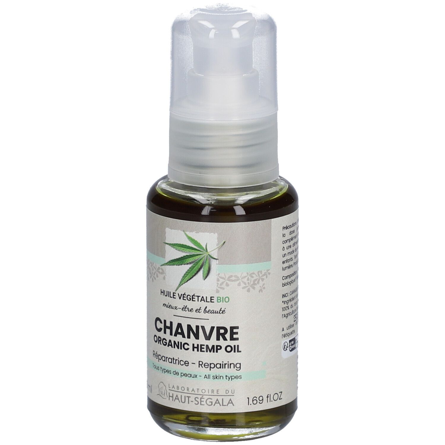 Flacon en verre avec pompe. Inscription: Chanvre, Organic Hemp Oil, Réparatrice, Tous types de peaux. Dos avec texte et labels.
