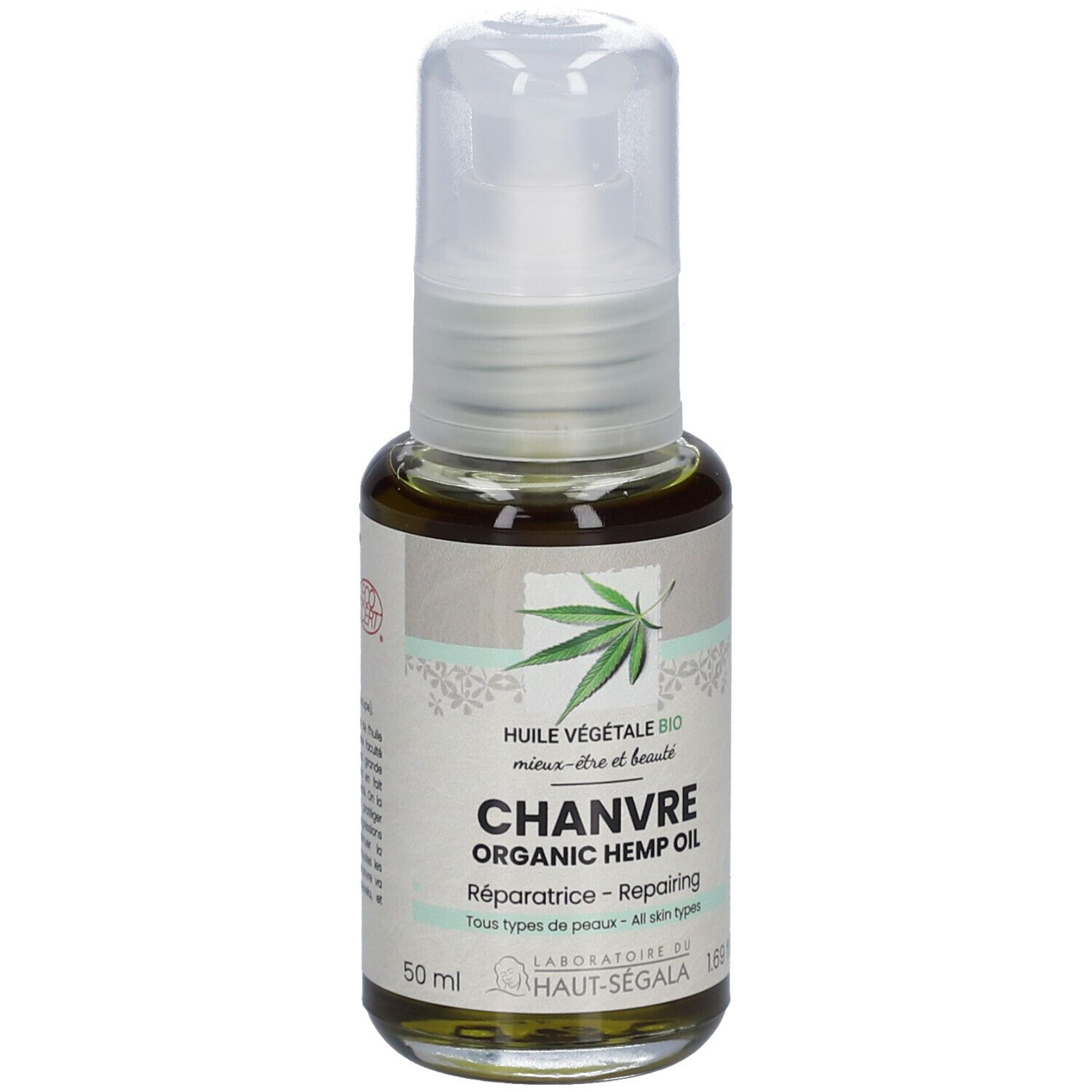 Flacon en verre avec pompe. Inscription: Chanvre, Organic Hemp Oil, Réparatrice, Tous types de peaux. Dos avec texte et labels.