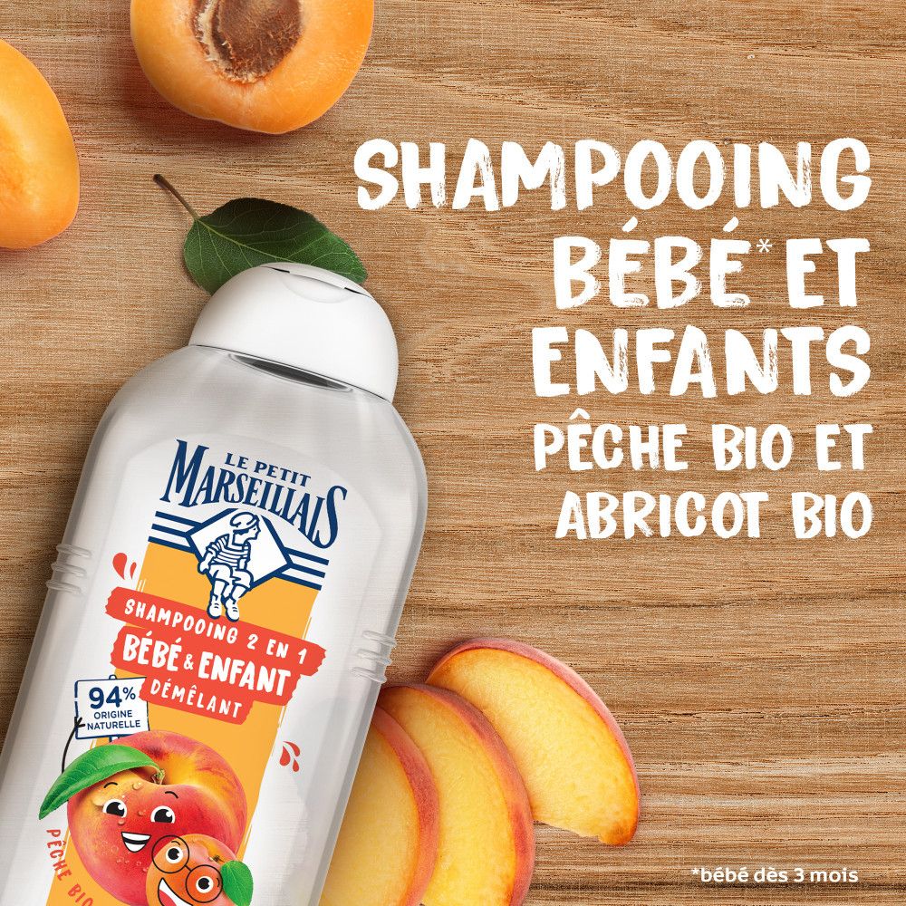 Bouteille de shampooing avec pêche et abricot. Texte: 'Shampooing bébé et enfants'.