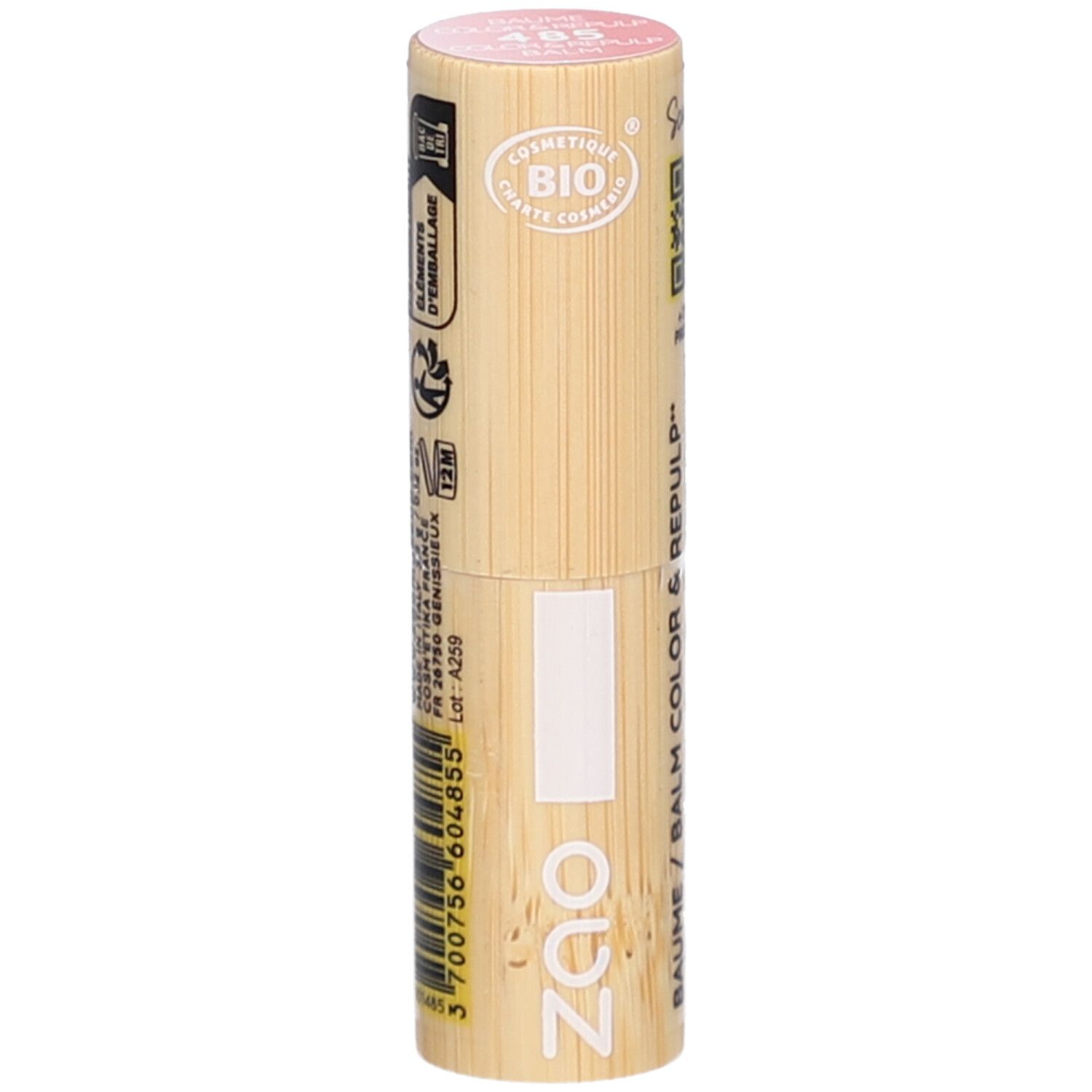 Cilindrische lippenbalsem-container van hout. Roze bovenkant, met opdrukken. Zichtbaar: ZAO-logo, COSMETIQUE BIO.
