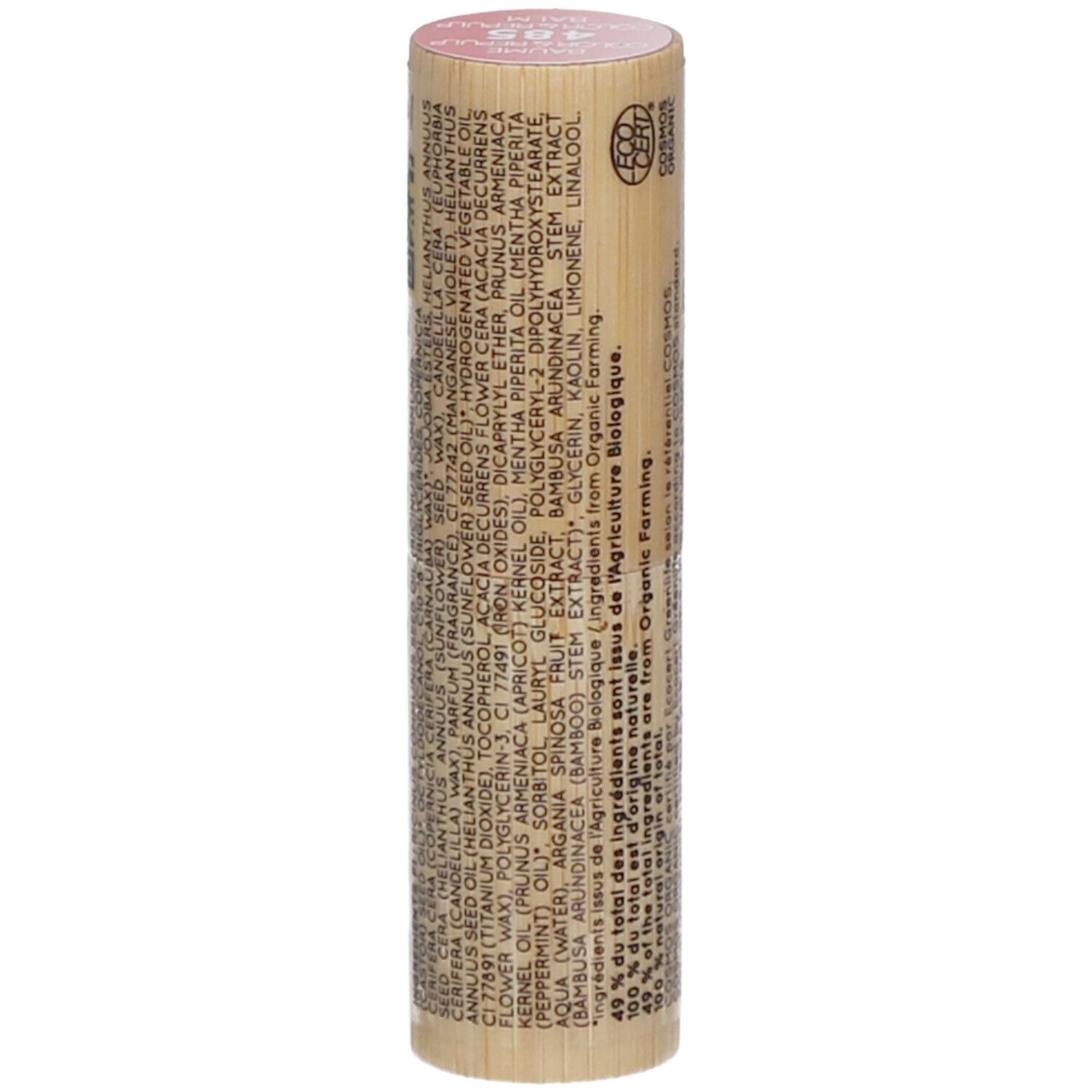 Cilindrische lippenbalsem-container van hout. Roze bovenkant, met opdrukken. Zichtbaar: ingrediënten, COSMOS ORGANIC.