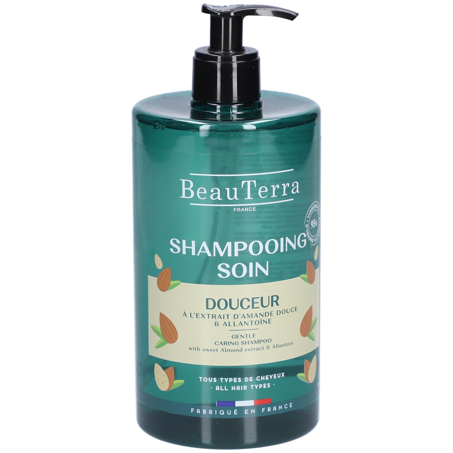 Flacon de shampooing vert avec pompe noire. Inscription: Beauterra, Shampooing Soin Douceur.