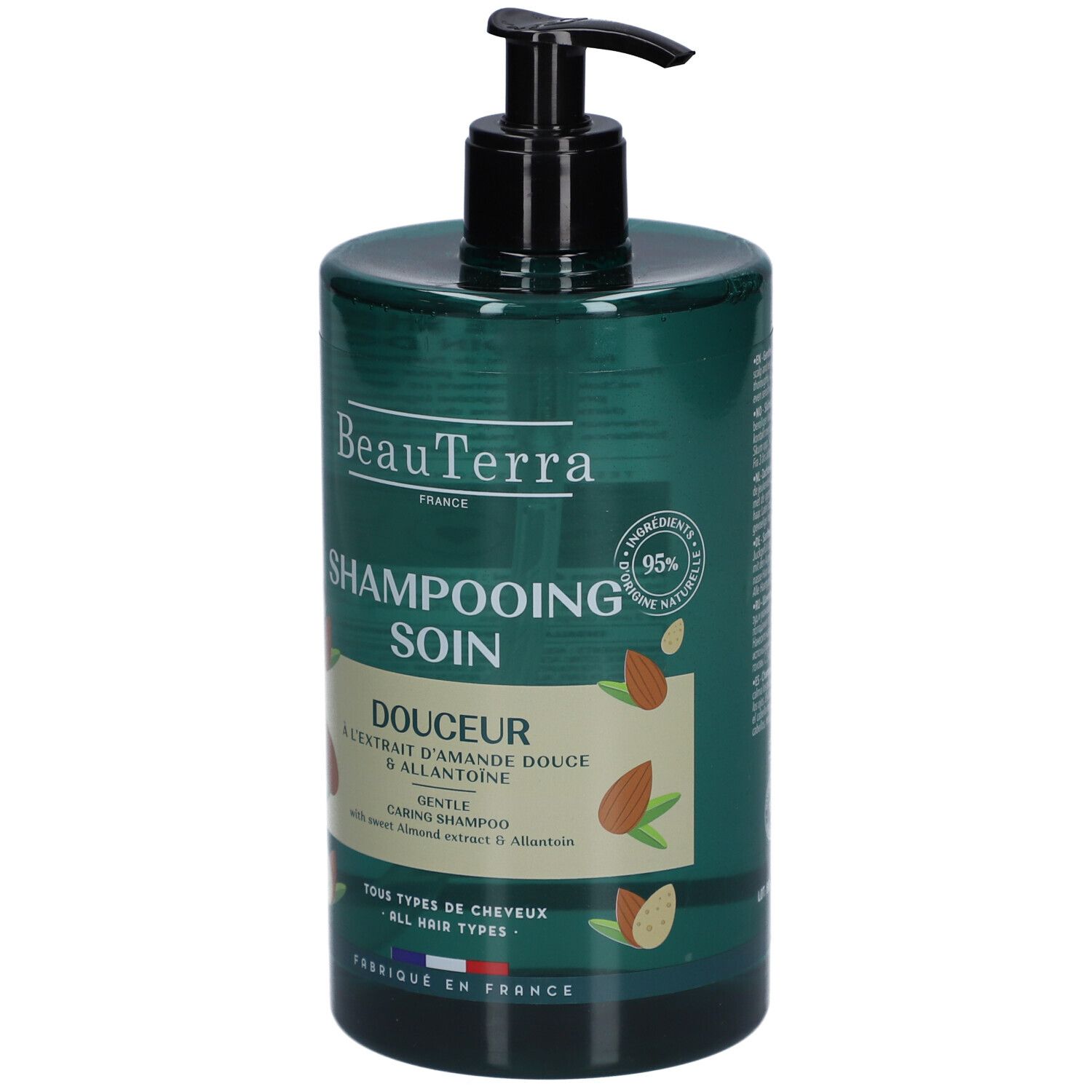 Flacon de shampooing vert avec pompe noire. Inscription: Beauterra, Shampooing Soin Douceur. 95% ingrédients naturels.
