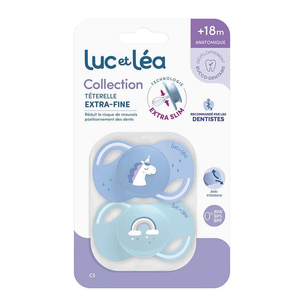 Verpakking met twee fopspenen van Luc et Léa. Blauwe en lichtblauwe fopspenen met eenhoorn en regenboog. Anatomisch, extra fijn.