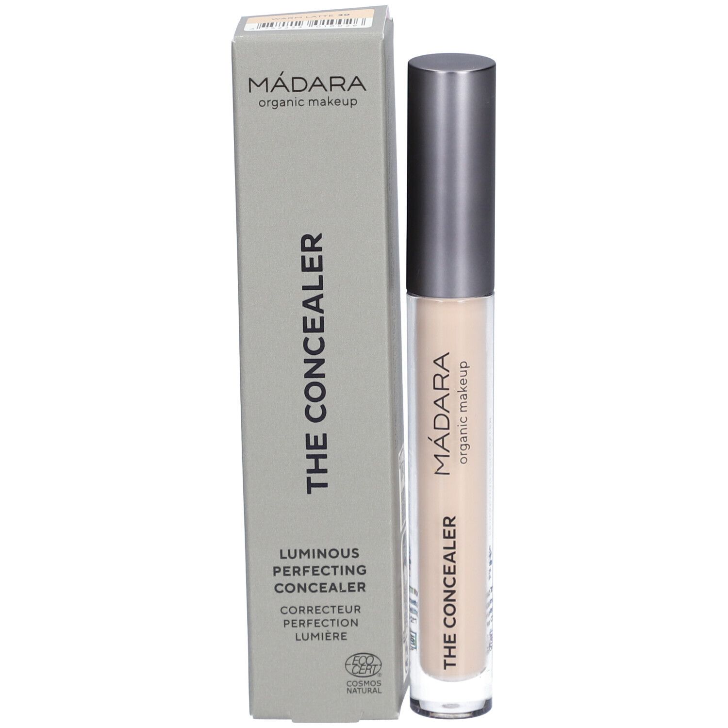 Beige concealer-stift en doos. Op de doos staat 'MÁDARA organic makeup' en 'THE CONCEALER'. Op de stift staat 'MÁDARA organic makeup'.