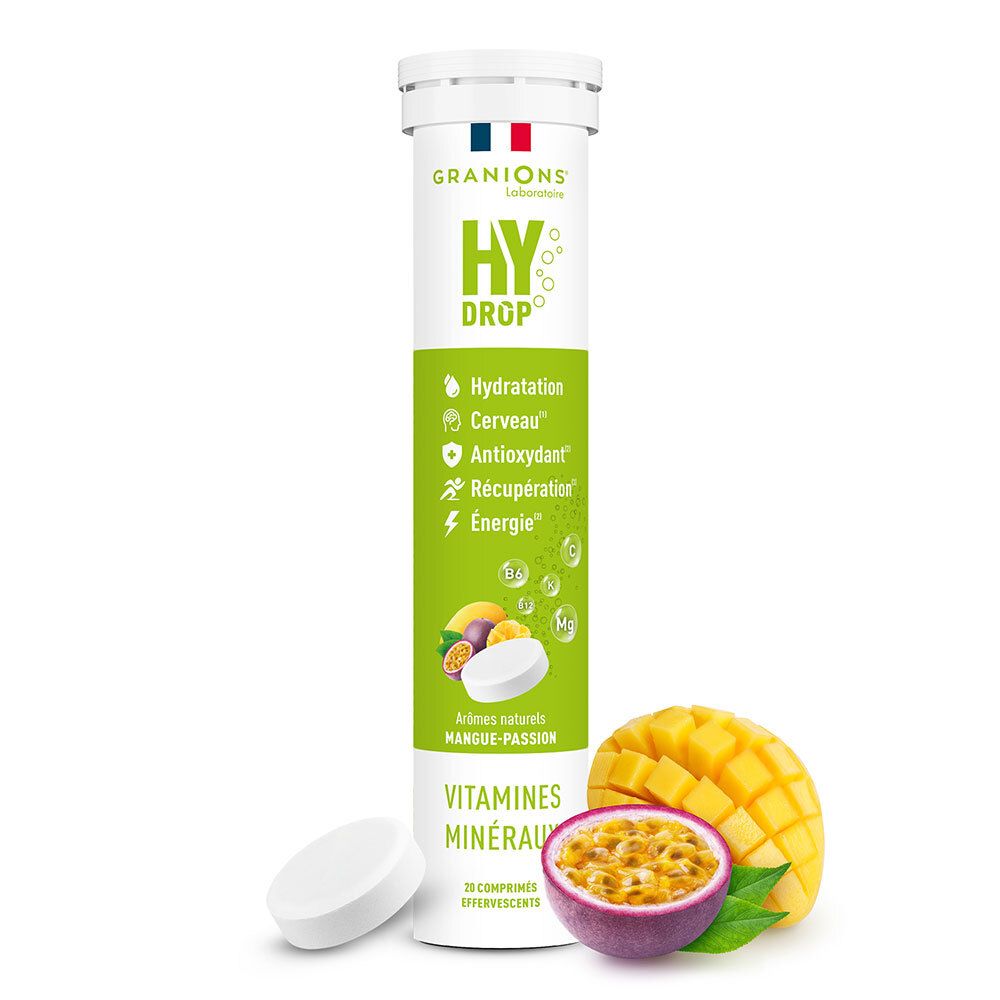 Tube de comprimés HYDROP, saveur mangue-passion. Fruits et comprimé à côté. Ingrédients: vitamines, minéraux.