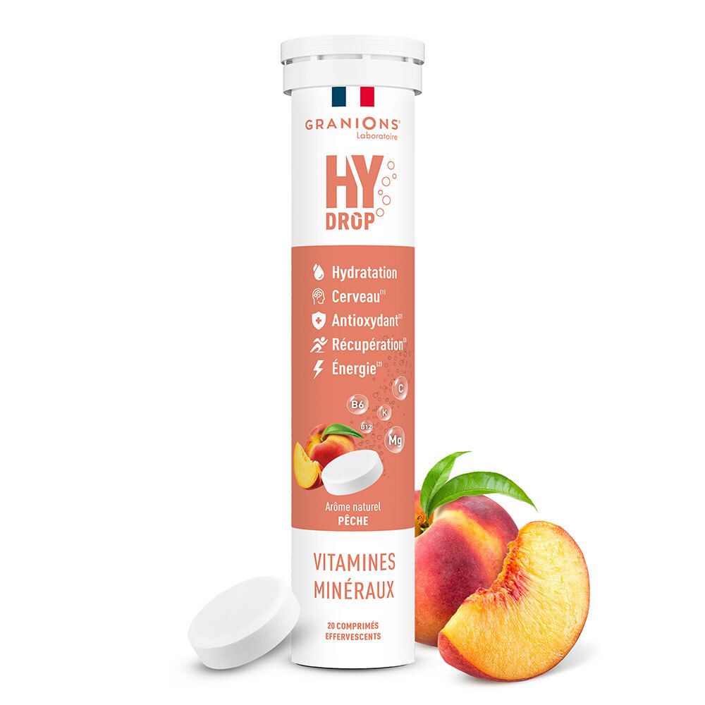 Tube de comprimés effervescents. Inscriptions: HYDROP, vitamines, minéraux, goût pêche. Pêche et comprimé à côté.