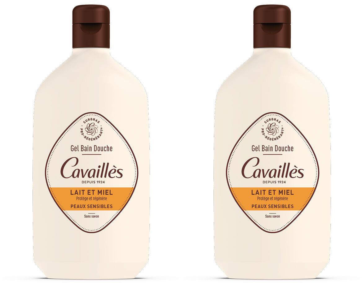 Deux flacons de gel douche. Inscription: Cavaillès, Lait et Miel, Peaux Sensibles. Bouchon marron, flacon crème.