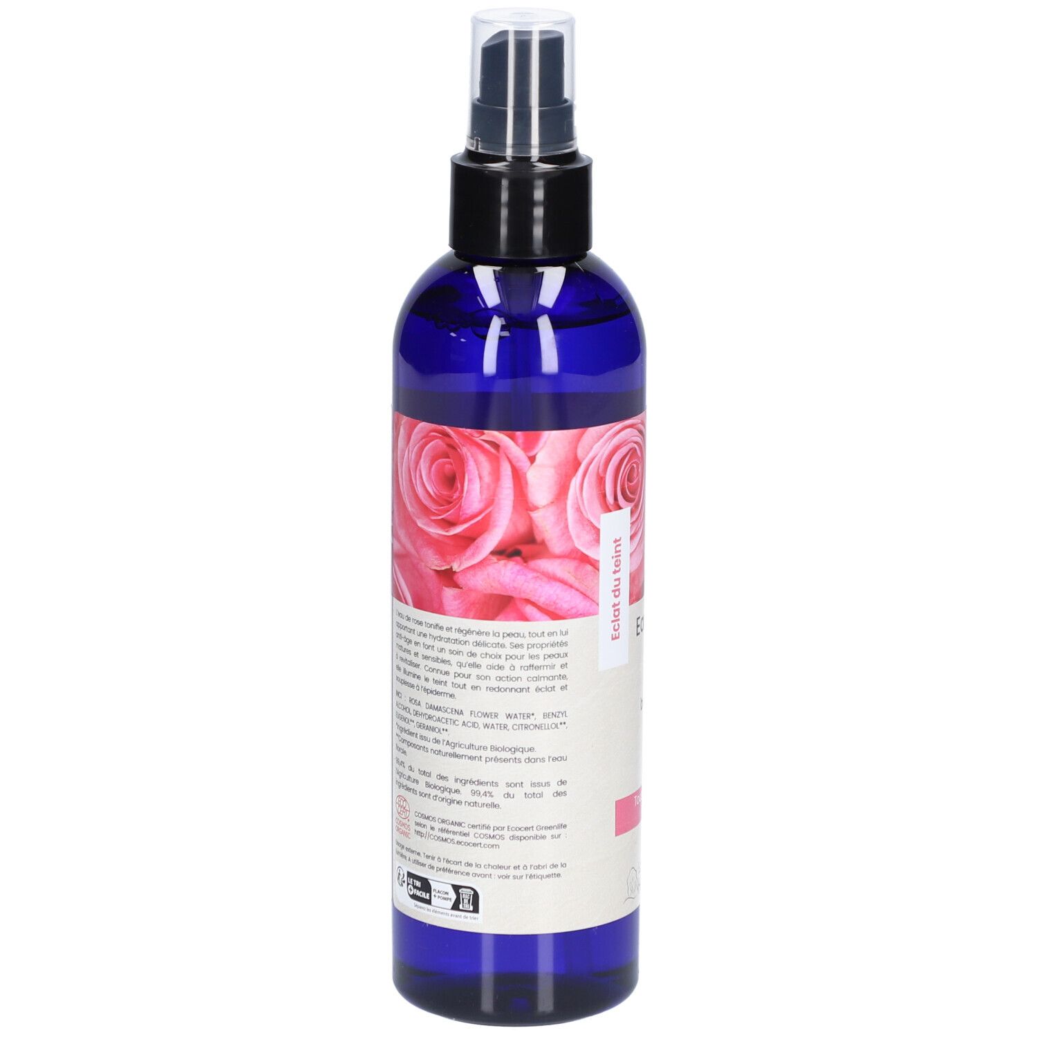 Blauwe fles met verstuiver. Achterkant met tekst en rozenmotief. Tekst: Eau florale de rose biologique. Bio-certificering.