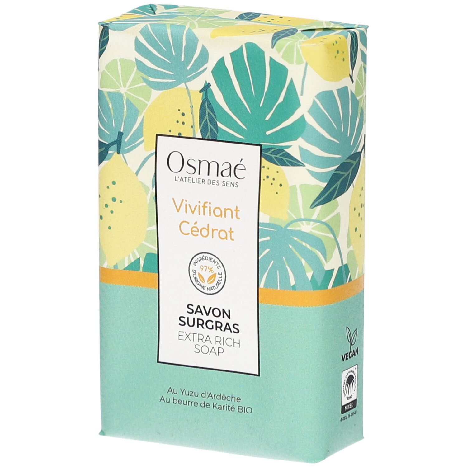 Rechthoekige zeepverpakking met bloemmotief en productnaam. Merk: Osmaé. Tekst: Savon Surgras, Vivifiant Cédrat.