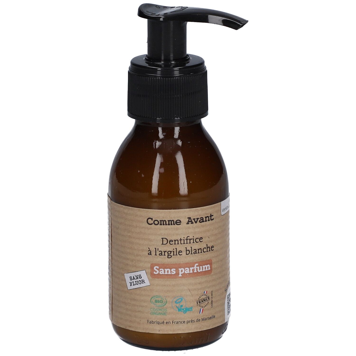 Flacon brun avec pompe noire. Étiquette: Comme Avant, Dentifrice à l'argile blanche, Sans parfum. Logos vegan et bio.