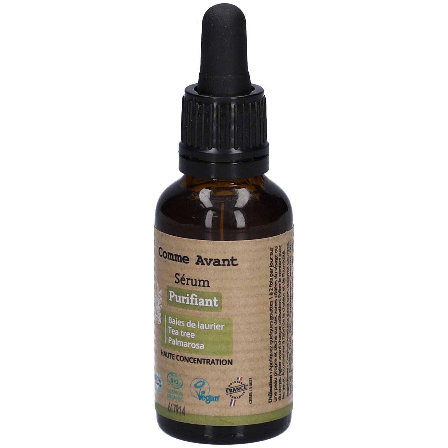 Bruine glazen fles met zwarte dop en pipet. Etiket met productnaam en ingrediënten. Vegan keurmerk.