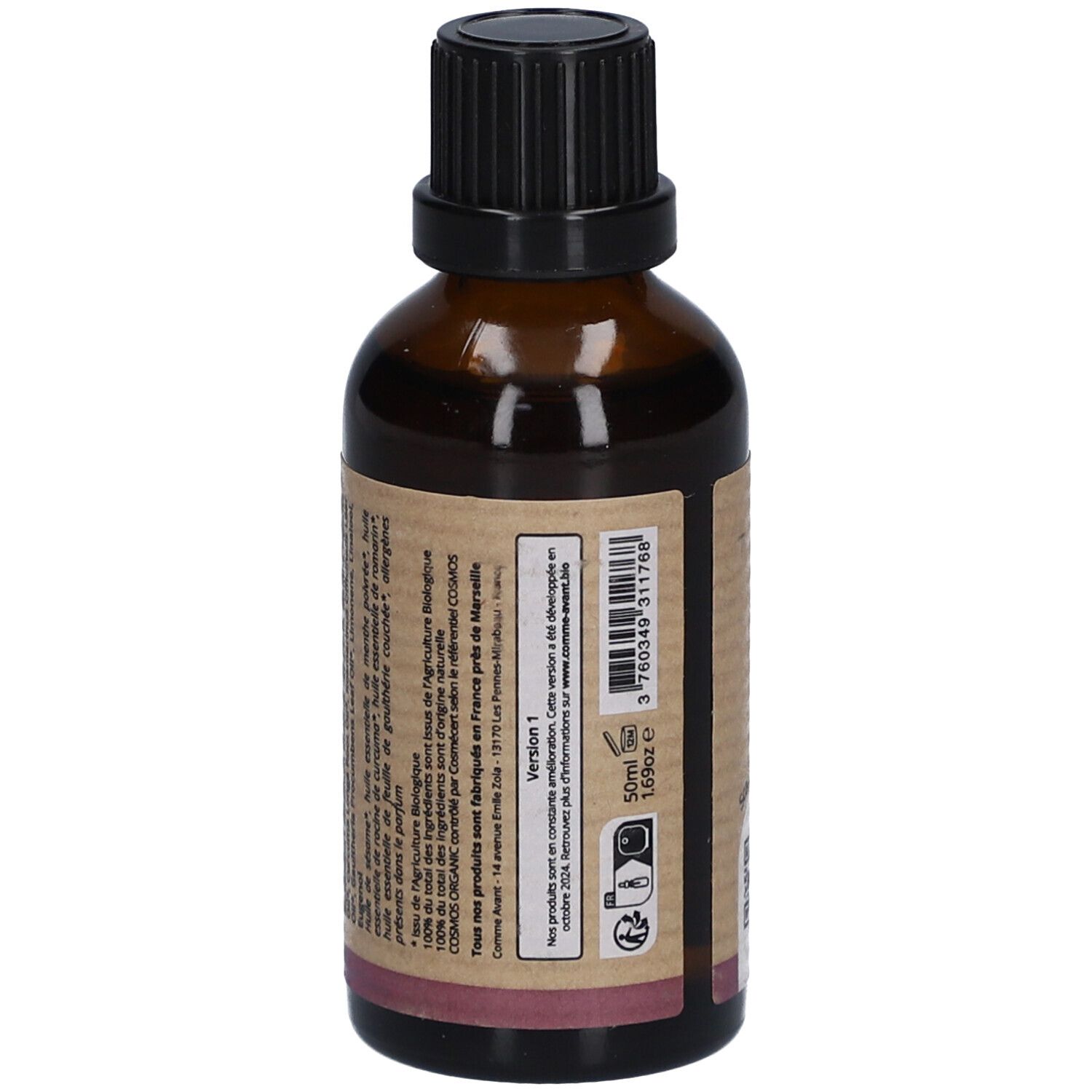 Achterkant van een bruine glazen fles. Etiket met tekst en informatie. "Comme Avant" en "Sérum Relaxant".