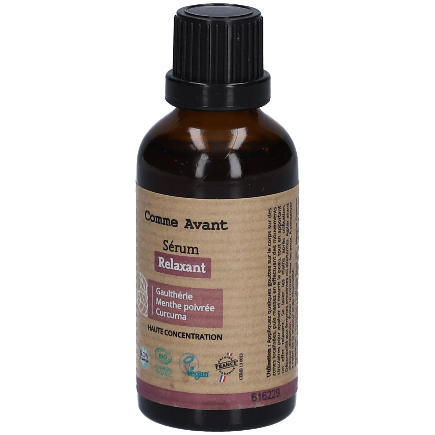 Bruine glazen fles met zwarte dop. Etiket met productnaam, ingrediënten en certificeringen. "Comme Avant" en "Sérum Relaxant".