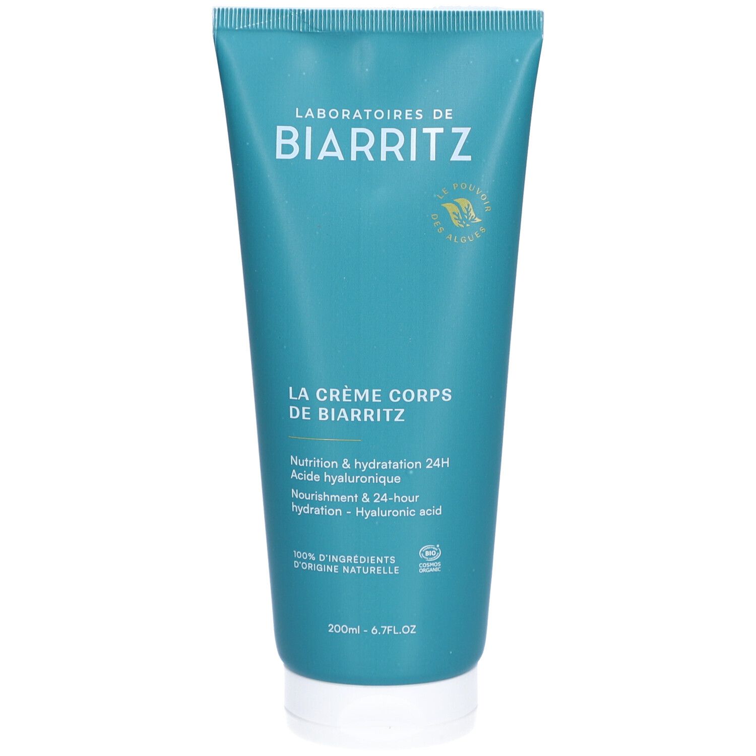 Tube turquoise avec bouchon blanc. Inscription: Laboratoires de Biarritz, La Crème Corps. Texte en français et anglais.