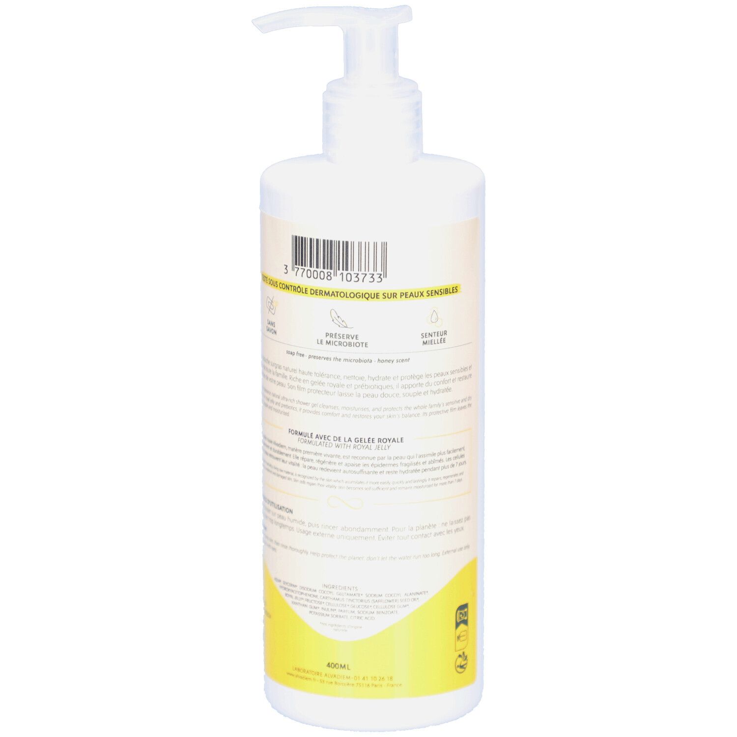 Achterkant van de fles. Tekst op crème achtergrond. Geel accent. Streepjescode en logo's.