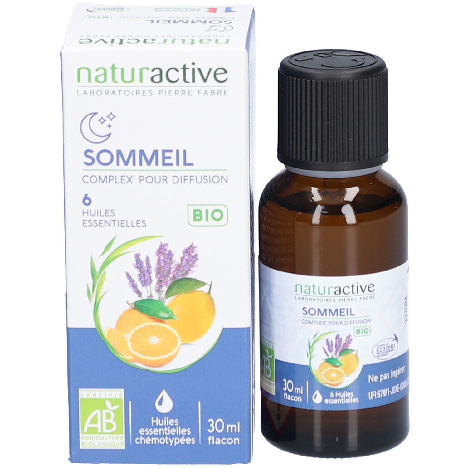 Flacon et emballage du produit. Flacon : verre brun, bouchon noir. Emballage : blanc, bleu, nom du produit, illustrations.