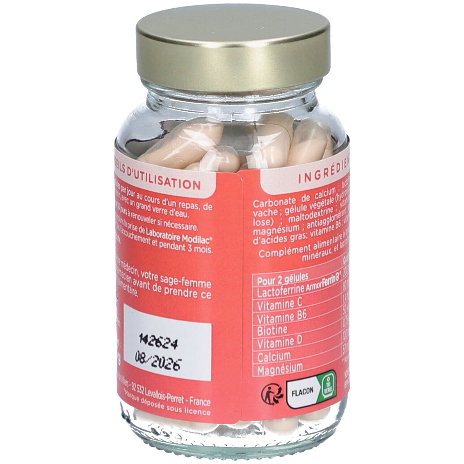 Dos du flacon en verre avec conseils d'utilisation. Étiquette "modilac mumboost". Date de péremption 08/2026.