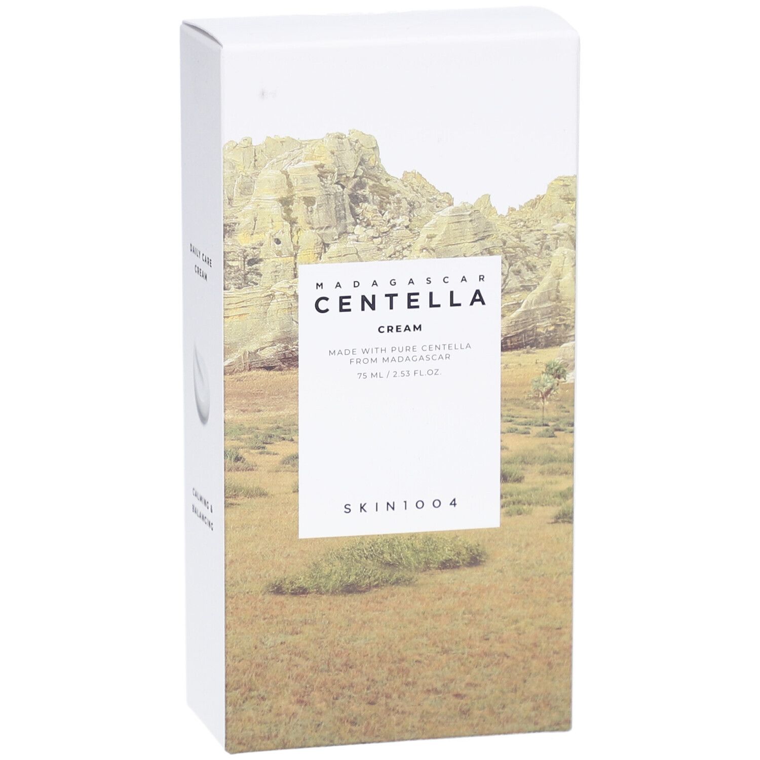 Voorkant van de SKIN1004 MADAGASCAR CENTELLA CREAM verpakking. Productnaam en landschapsafbeelding.
