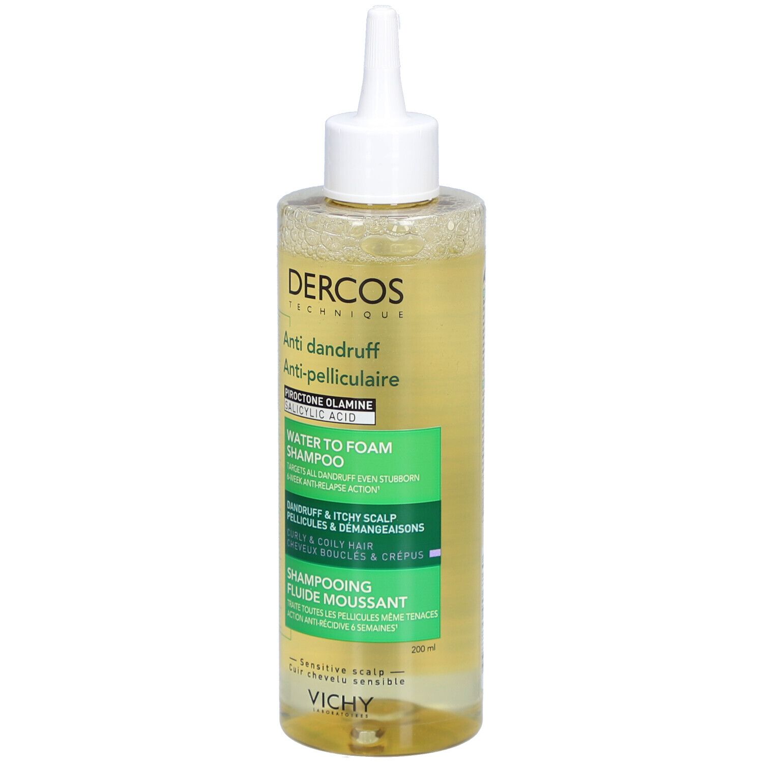 Shampooing liquide clair en flacon transparent avec applicateur blanc. Inscriptions: DERCOS, Anti-pelliculaire, Shampooing eau-mousse.