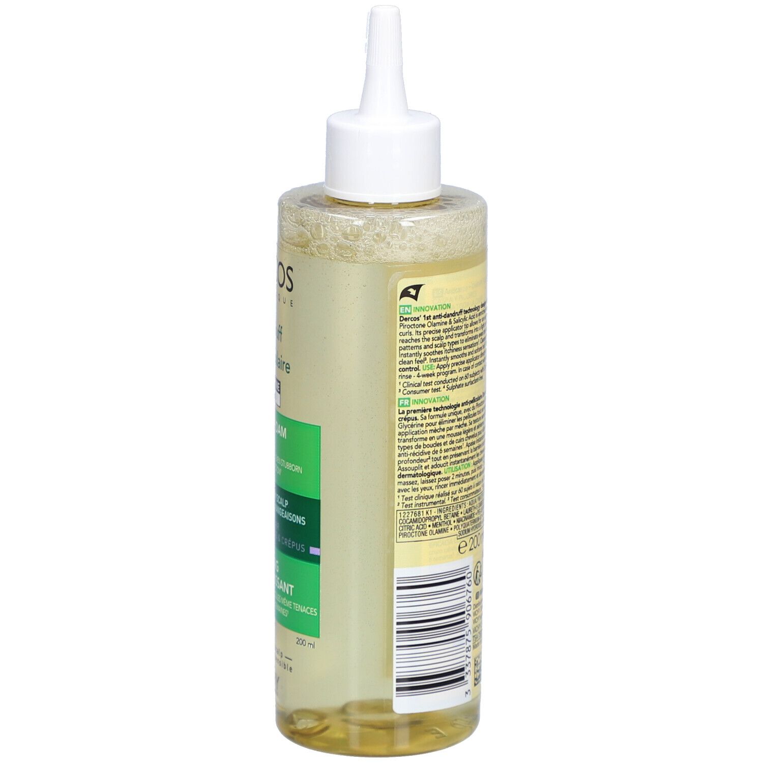 Dos du flacon de shampooing. Texte et QR code sur étiquette jaune-vert. Contient des informations sur le produit et son utilisation.