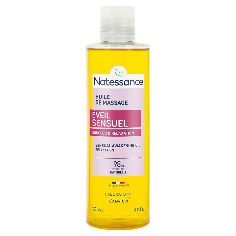 Gele fles massageolie. Opschrift: Natessance, Huile de Massage, Éveil Sensuel. 98% Naturelle.