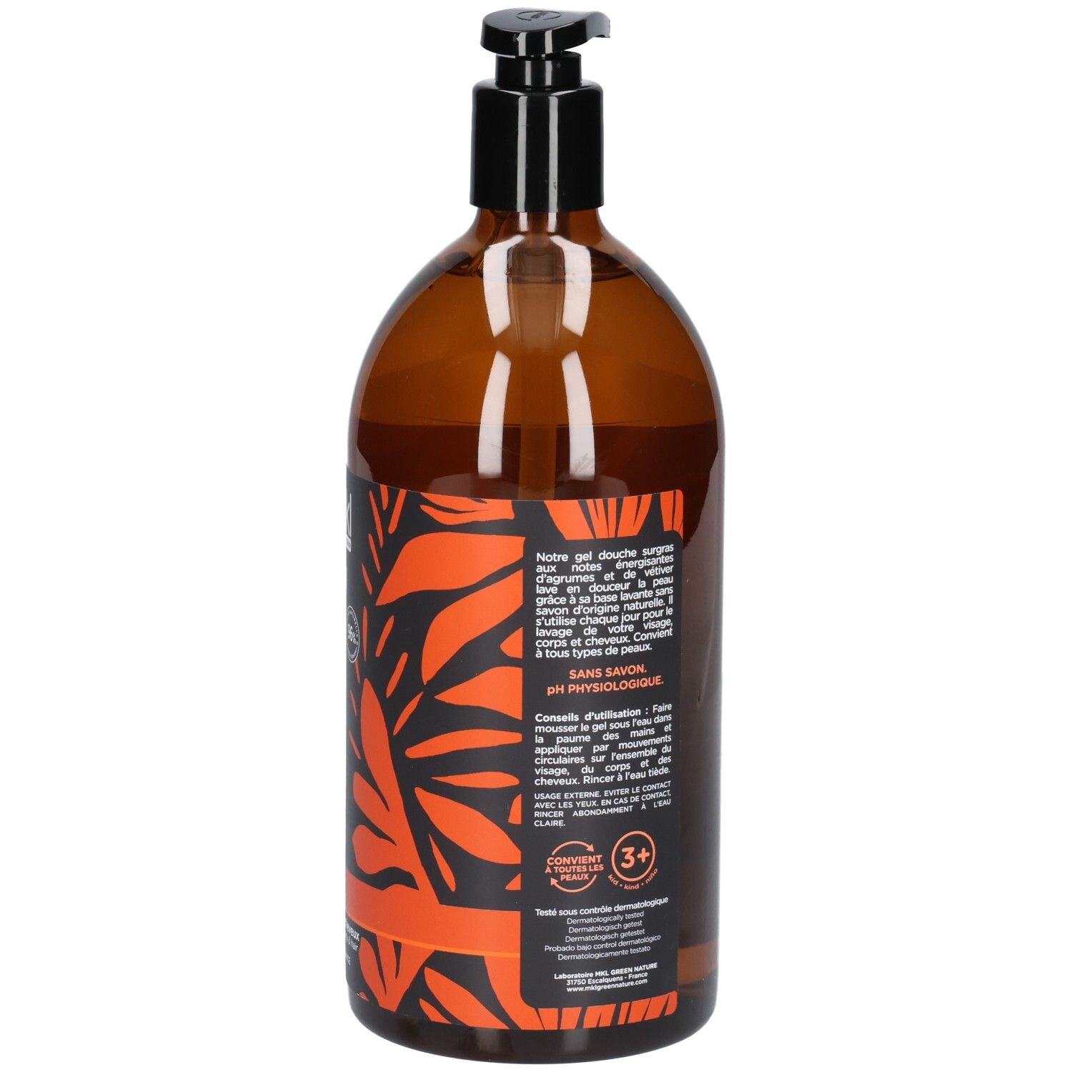 Flacon pompe brun avec étiquette à motif de feuilles orange et noir. Contient du gel douche.