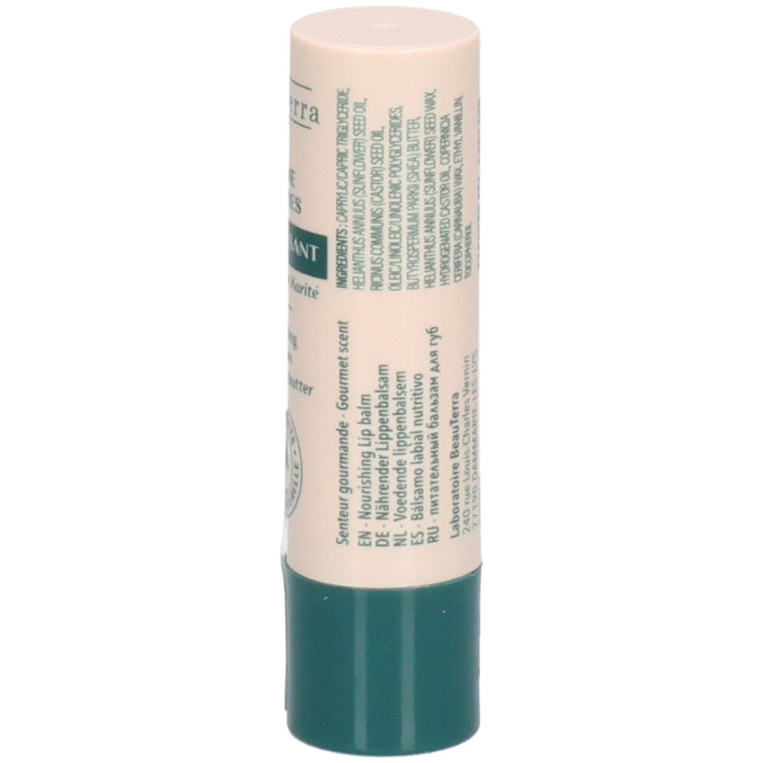 Lipbalsemstift. Beige-groene huls. Opschrift: Ingrediënten, geur. Tekst in meerdere talen.