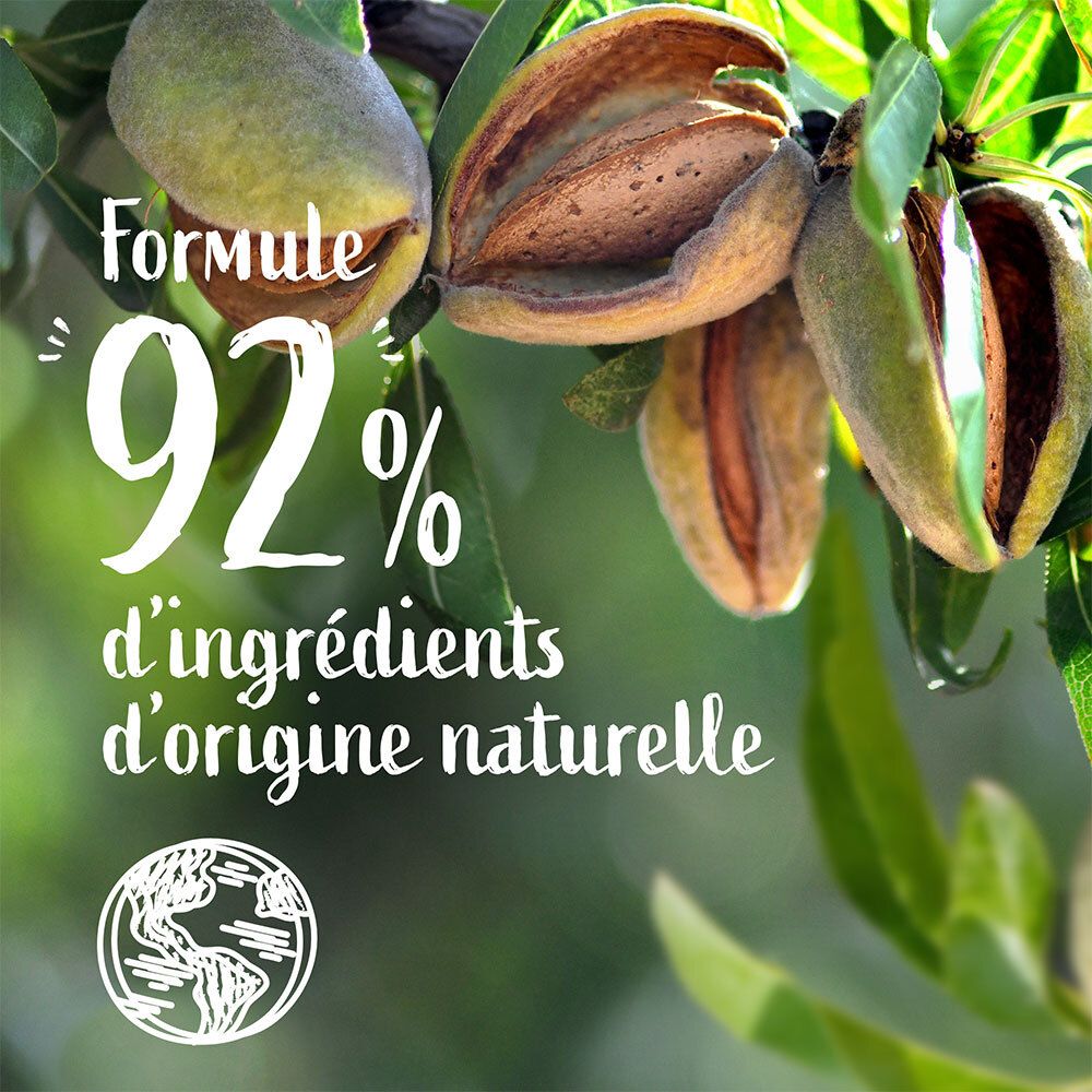 Amandes sur un arbre. Texte : « 92 % d'ingrédients d'origine naturelle ».