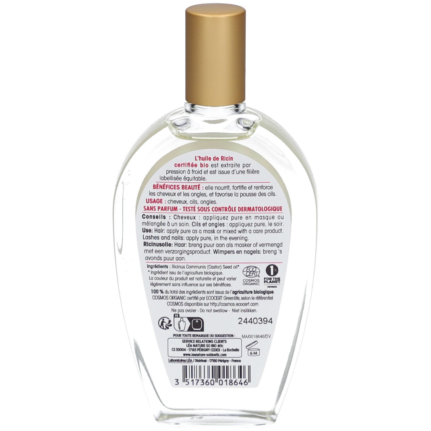 Achterkant van de SO BIO ETIC ricinusoliefles. Transparante glazen fles met tekst en logo op etiket.