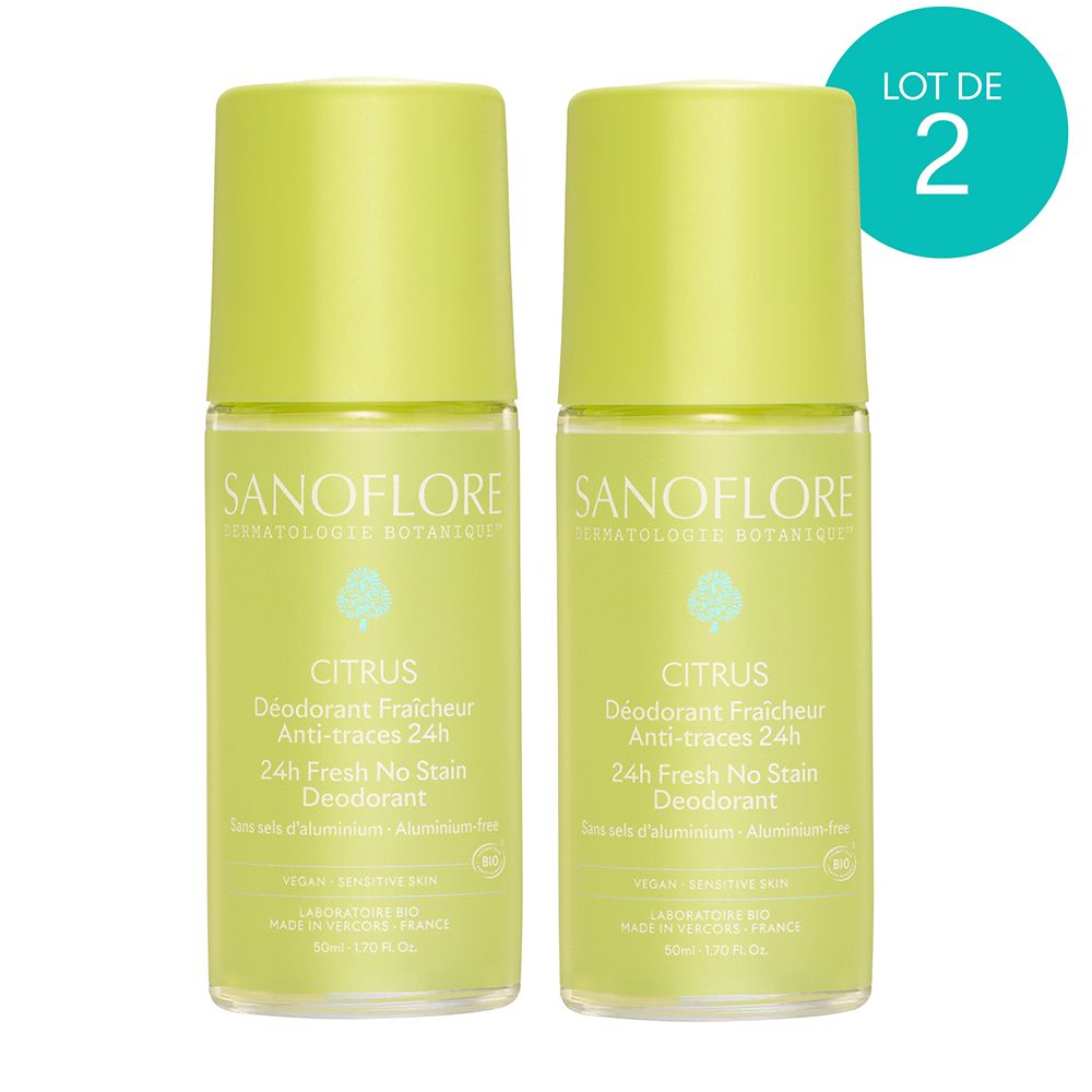 Twee roll-on deodorants. Groen-gele flessen met doppen. Tekst: Sanoflore, Citrus, 24H Fresh No Stain Deodorant. Sticker: Lot de 2.