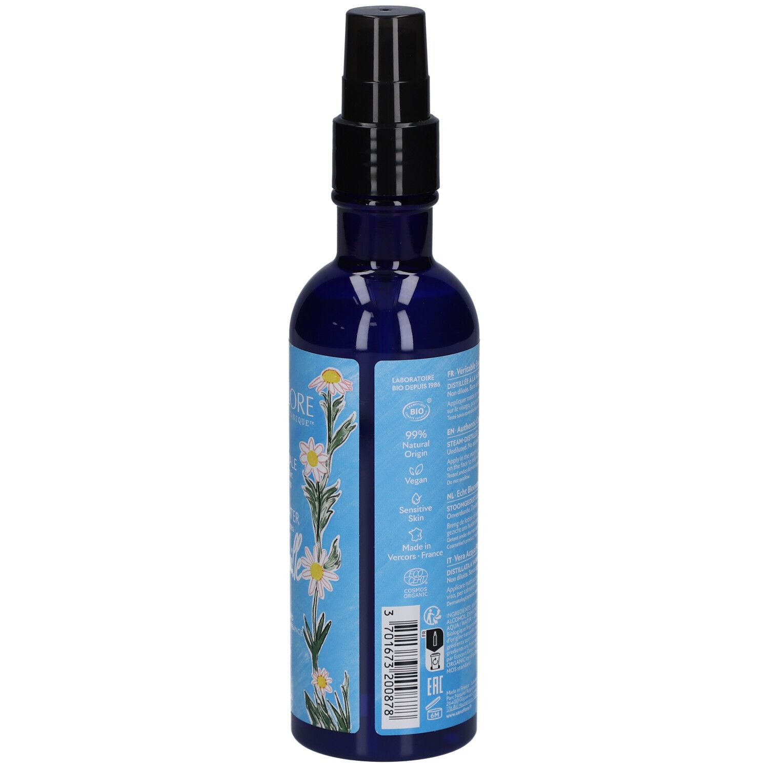 Dos du flacon bleu avec vaporisateur noir. Texte multilingue. Certification bio.