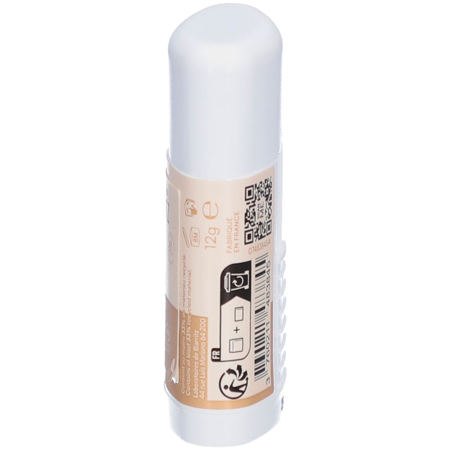 Dos d'un stick blanc. Étiquette beige avec texte, QR code et code-barres. Inscription: 12g e.