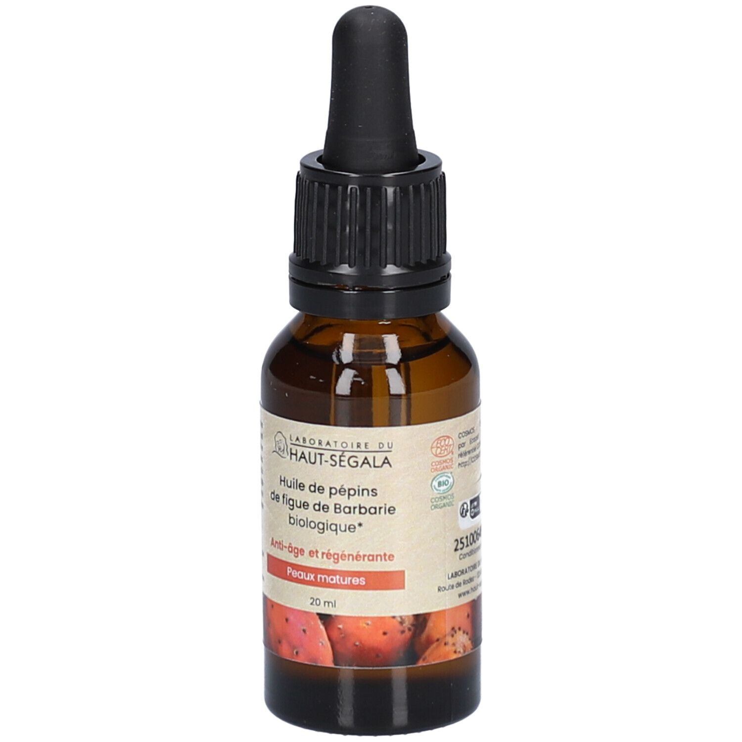 Bruine glazen fles met zwarte druppelaar. Etiket met tekst. Productinformatie en logo. 20 ml.