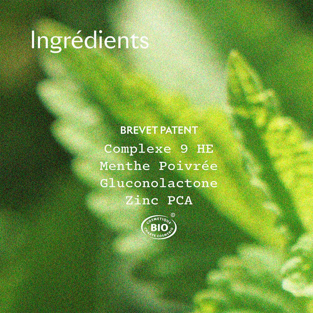 Close-up van groene bladeren. Tekst: Ingrédients. Tekst: Complexe 9 HE, Menthe Poivrée, Gluconolactone, Zinc PCA. Logo.