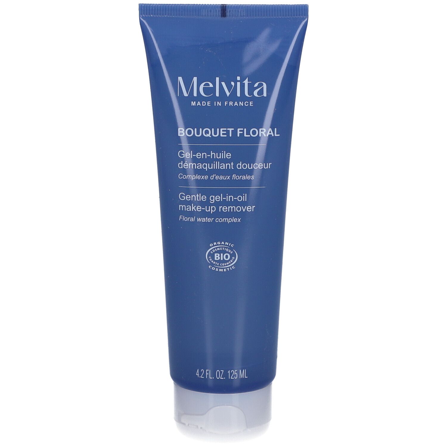 Tube bleu, bouchon blanc. Inscriptions: Melvita, Bouquet Floral, Gel-en-huile démaquillant douceur. Certification Bio.