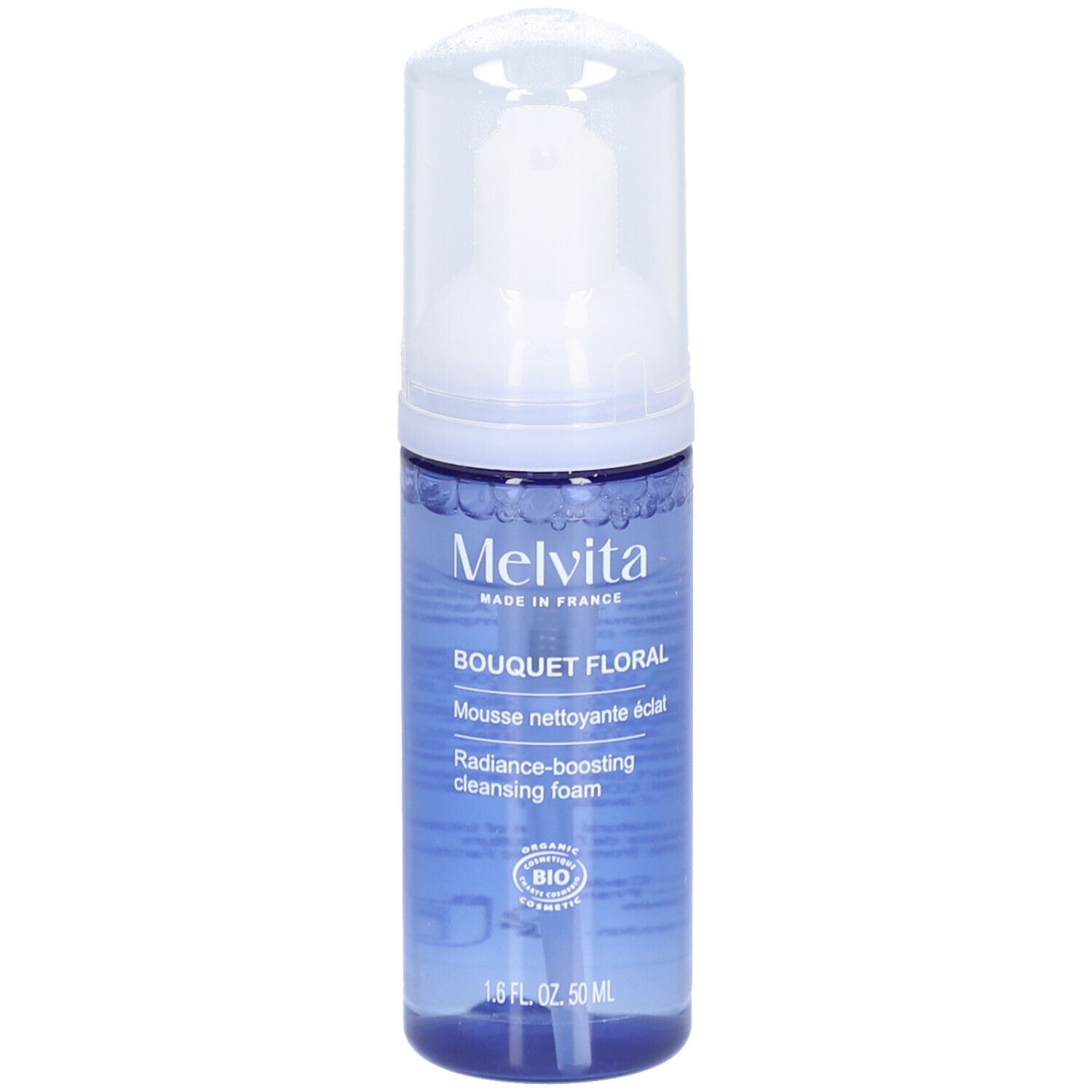 Blauwe transparante fles met witte pomp. Opschrift: MELVITA, Bouquet Floral, Mousse nettoyante éclat, Radiance-boosting cleansing foam.