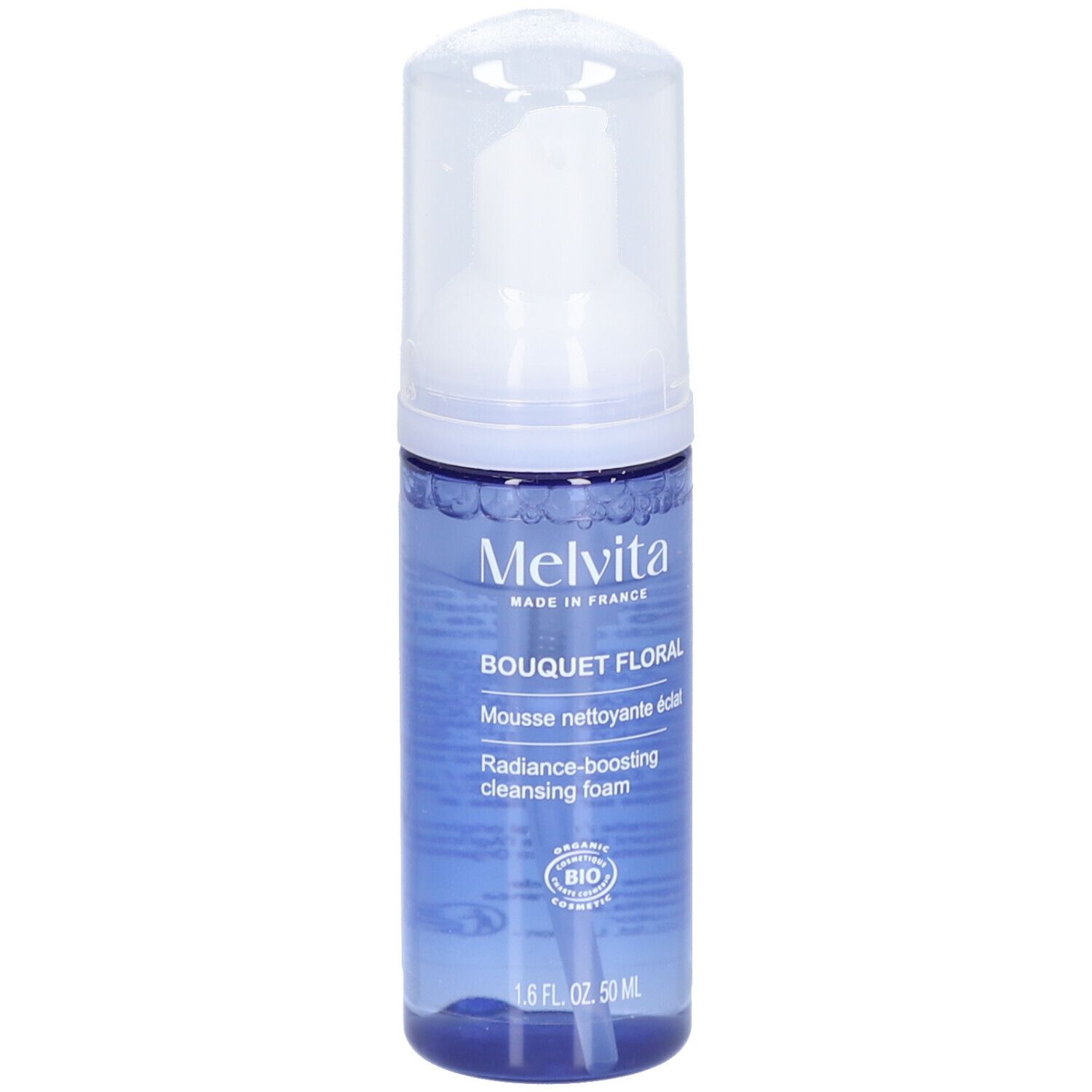 Blauwe transparante fles met witte pomp. Opschrift: MELVITA, Bouquet Floral, Mousse nettoyante éclat, Radiance-boosting cleansing foam.