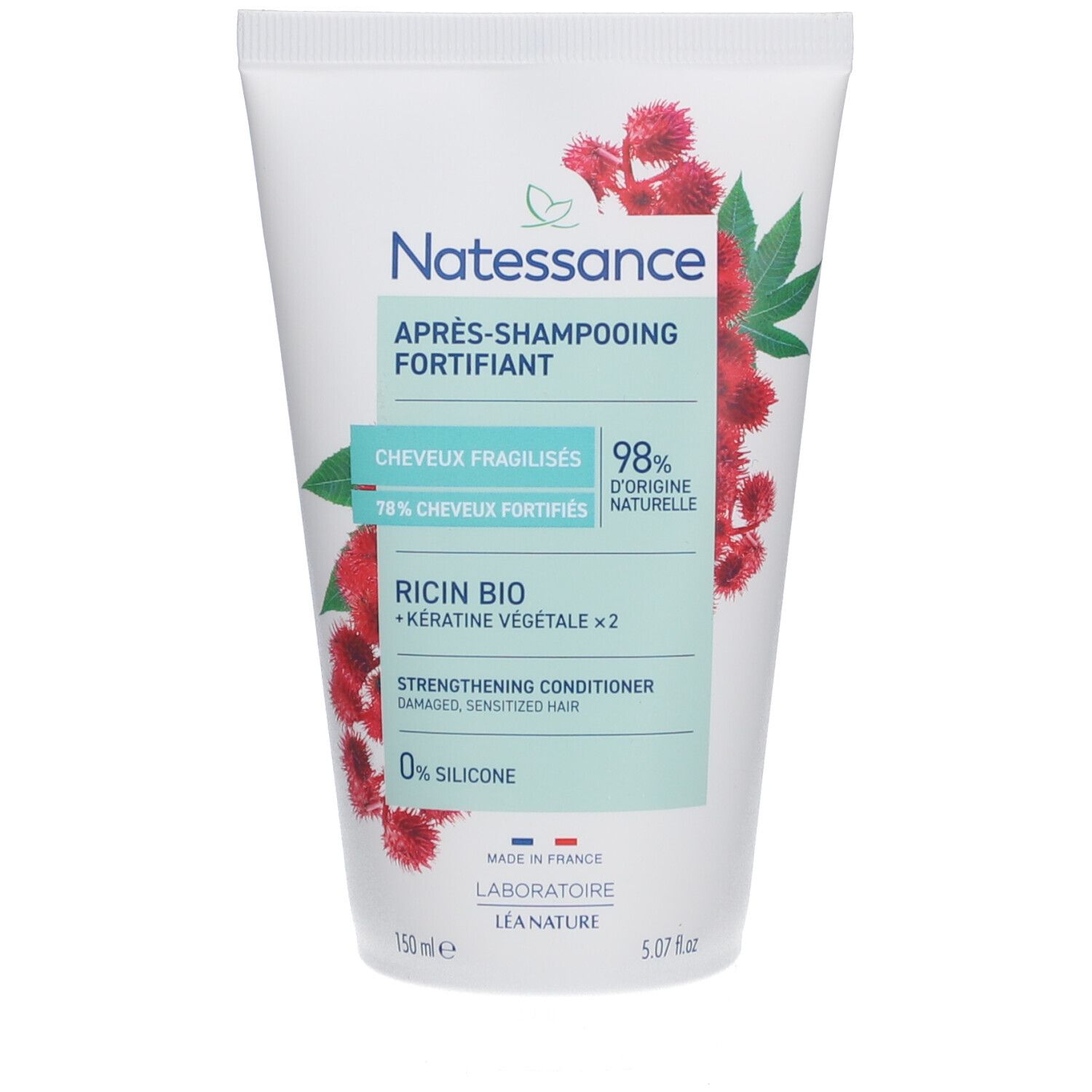 Witte tube met rode bloemenillustratie. Tekst: NATESSANCE, Après-shampooing fortifiant, Ricin Bio, Keratine végétale x2.
