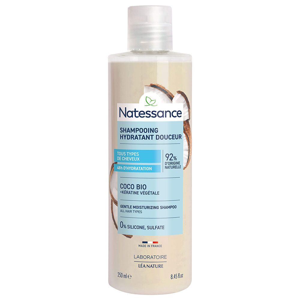 Flacon de shampooing. Inscription: NATESSANCE, Shampoing hydratant douceur, Coco Bio. 92% d'ingrédients naturels. Tous types de cheveux.