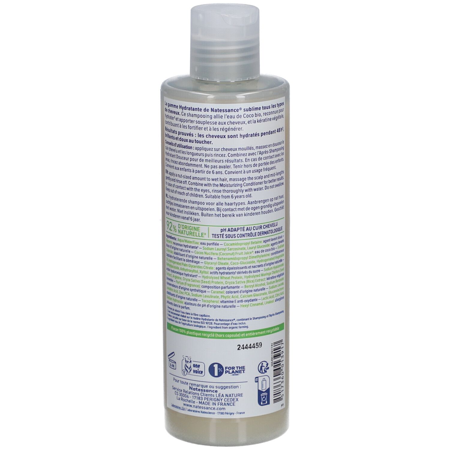 Dos du flacon de shampooing. Texte: instructions d'utilisation, ingrédients, pH, testé dermatologiquement. Logos: 1% for the planet, Le Nature.
