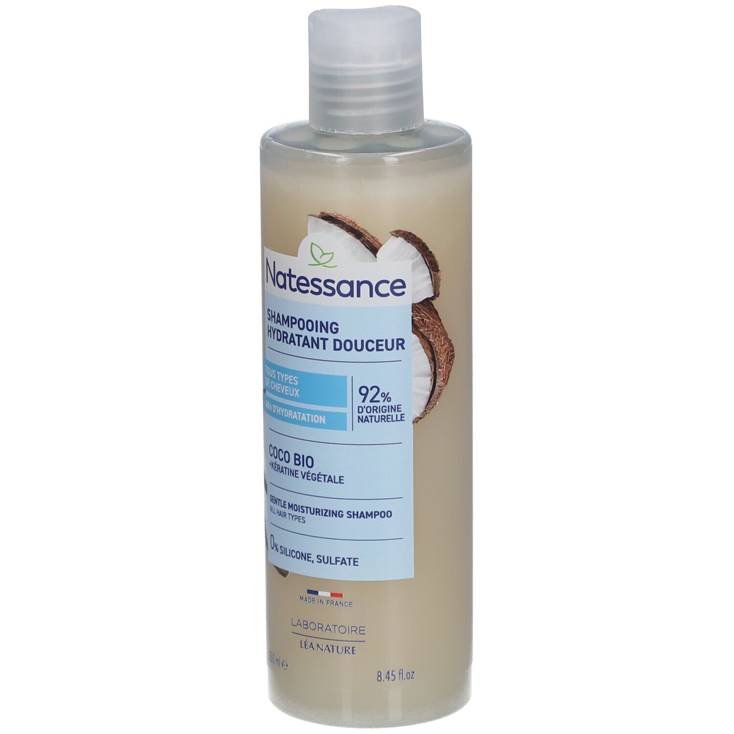 Flacon de shampooing. Inscription: NATESSANCE, Shampoing hydratant douceur, Coco Bio. 92% d'ingrédients naturels. Tous types de cheveux.