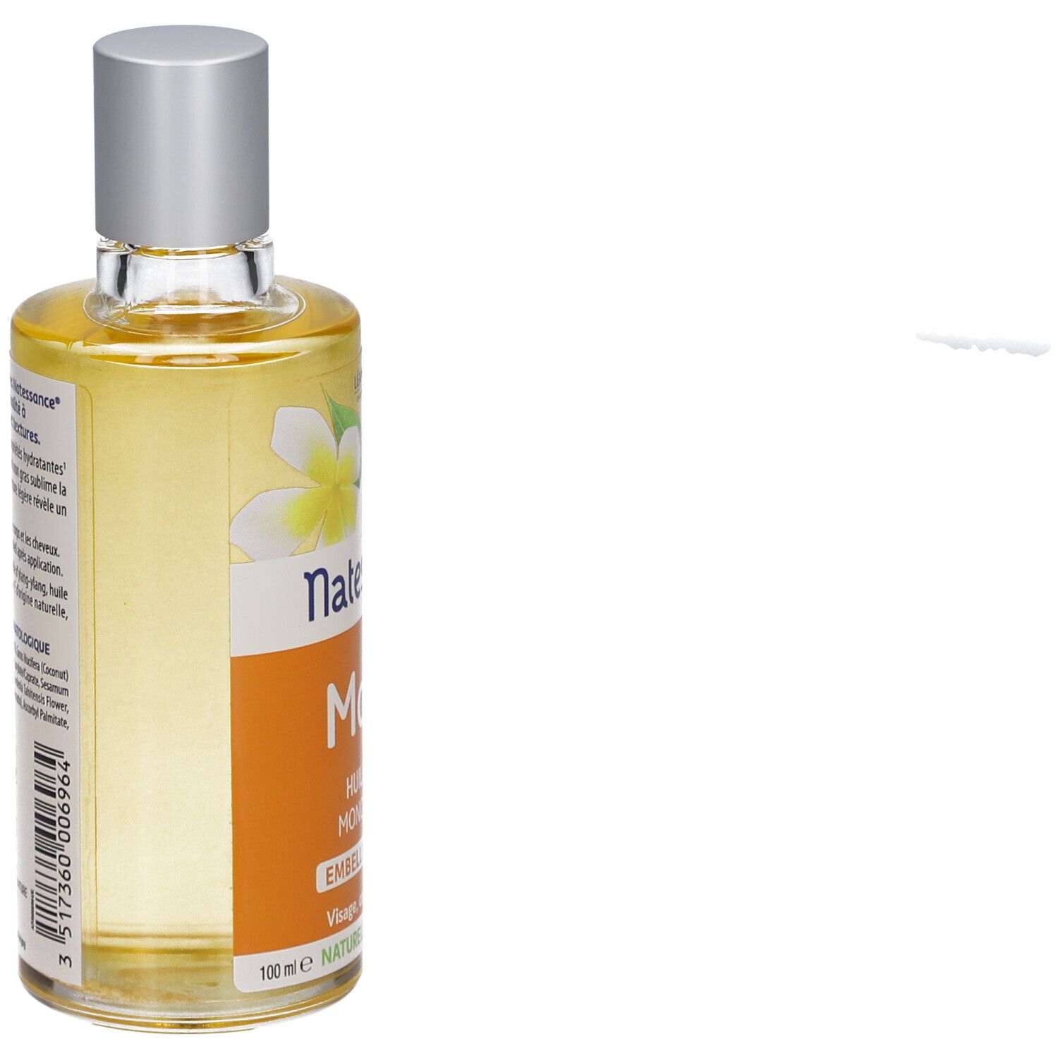 Flesje Natessance Monoï droge olie. Oranje etiket met witte bloemen. Zilveren dop.